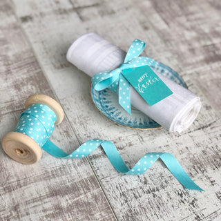 Jane Means turquoise ribbon
