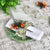 sage stripe ribbon and orange decorations